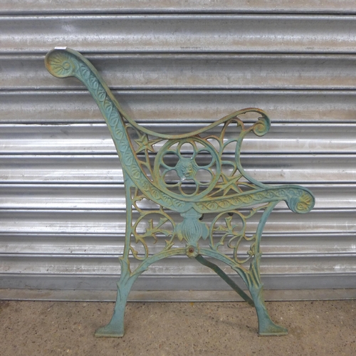 2274 - A pair of cast iron bench ends