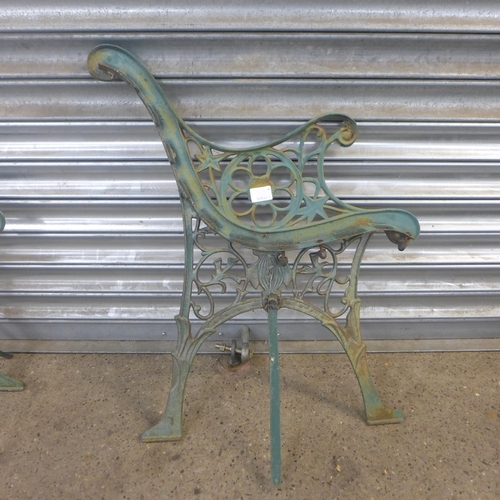 2274 - A pair of cast iron bench ends