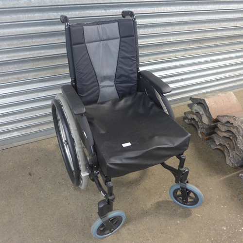 2285 - An Invacare Action 3 large wheel wheelchair and walker