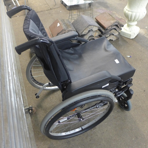 2285 - An Invacare Action 3 large wheel wheelchair and walker