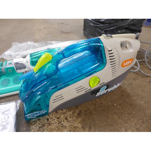 2314 - A Vax sweeper vac and attachments (model no. VO36)