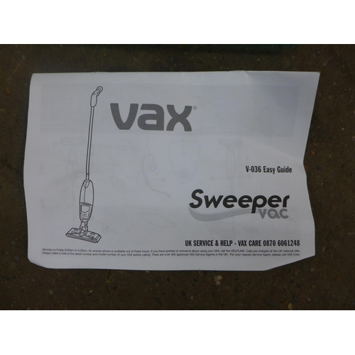 2314 - A Vax sweeper vac and attachments (model no. VO36)