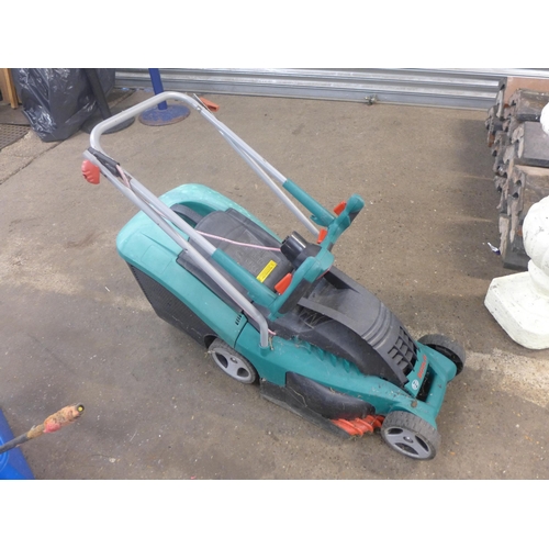 2326 - A Bosch lawn mower, two spare collectors and a box of jet wash parts