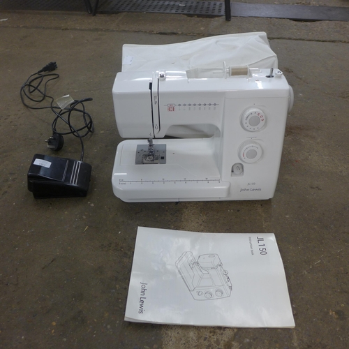 2361 - A John Lewis JL150 sewing machine with instruction manual