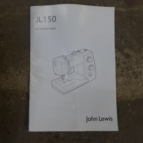 2361 - A John Lewis JL150 sewing machine with instruction manual