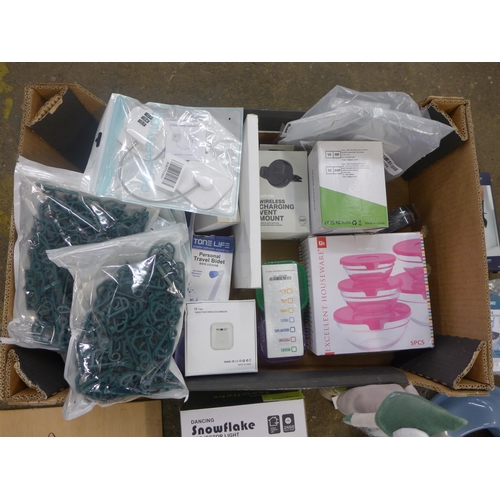 2405 - A box of misc. inc. dancing snowflake projector lights, child locks, in car phone chargers, stacking... 