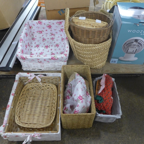 2420 - Approximately ten items of wicker including baskets and trays