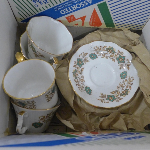 2427 - 5 Boxes of kitchen items: trays, bowls, teapot, mugs