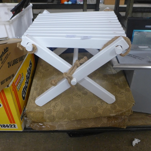 2428 - A folding white stool, unused and two boxed