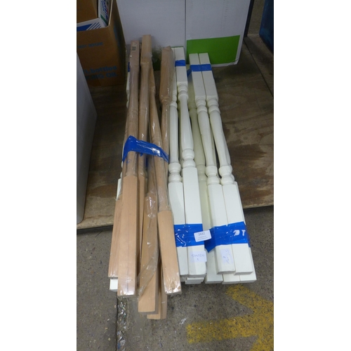 2432 - A quantity of wooden spindles