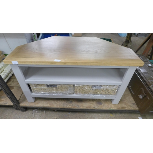 2433 - A shaker corner TV unit with seagrass baskets