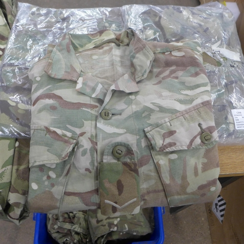 2447 - A bag of military/army clothing including trousers and shirts