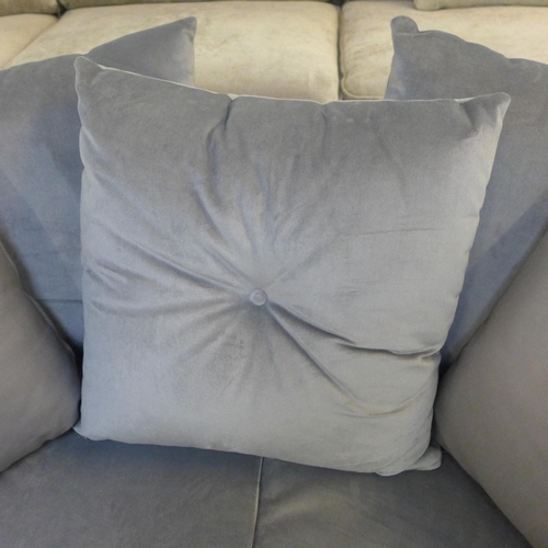 1322 - A grey velvet upholstered scatter back two seater sofa