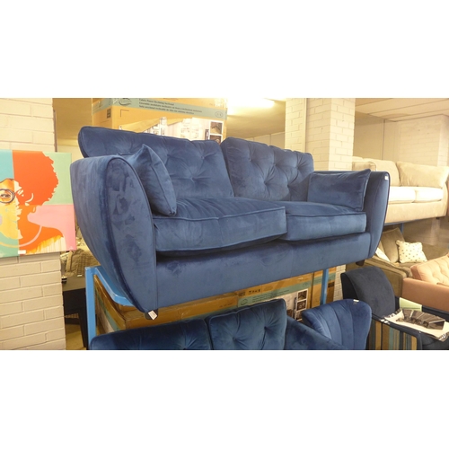 1346 - A Hoxton deep blue velvet upholstered three seater sofa - RRP £799