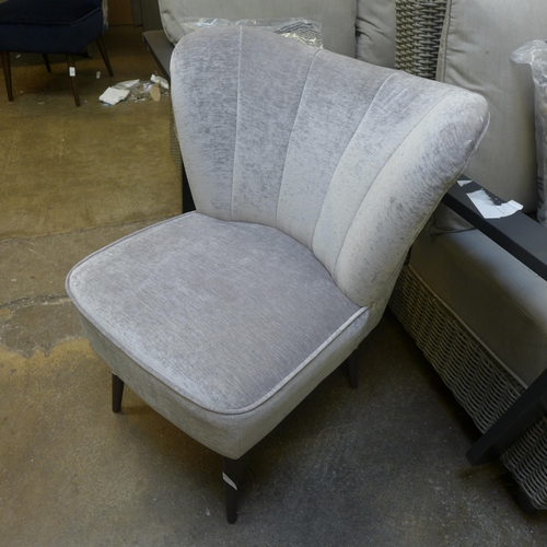 1461 - A silver velvet upholstered shell back side chair