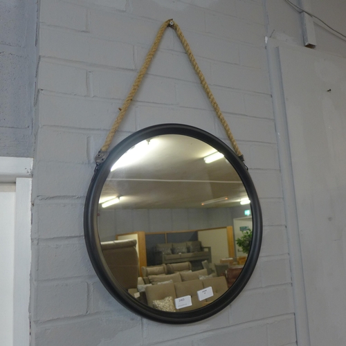 1465 - A medium round black metal mirror on a hanging rope H46cm (JRG1809)