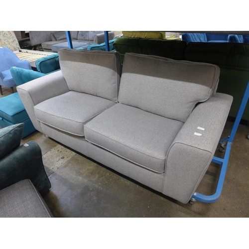 1475 - A mid-grey upholstered three seater sofa