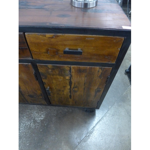 1496 - An industrial style hardwood and metal three door, three drawer sideboard on wheels  *This lot is su... 