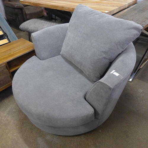 1499 - A mid-grey upholstered swivel loveseat (slight damage to arm)