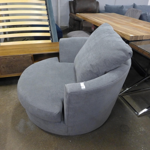 1499 - A mid-grey upholstered swivel loveseat (slight damage to arm)