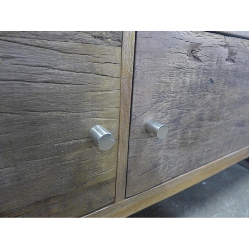 1500 - A railway sleeper two door single shelf TV stand  *This lot is subject to VAT