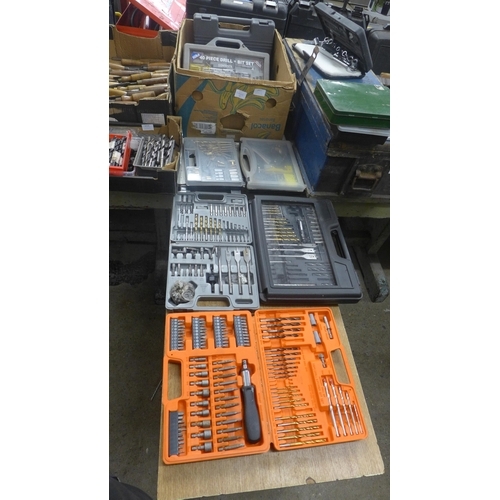 2057 - A quantity of drill bits, nuts, bolts, electric connectors and tool kits