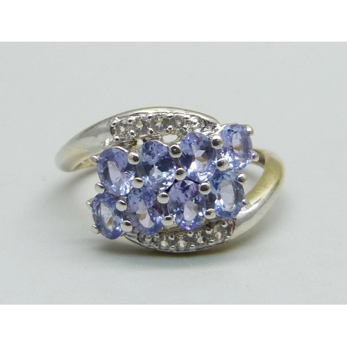 1052 - A silver gilt and tanzanite cluster ring, Q