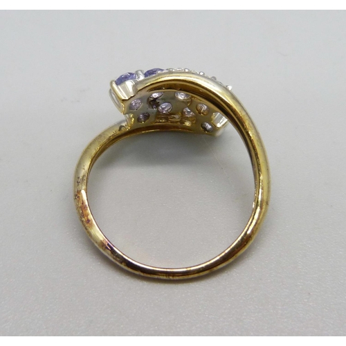 1052 - A silver gilt and tanzanite cluster ring, Q