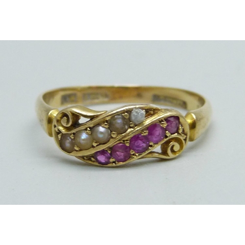 1058 - An 18ct gold, ruby and pearl ring, the inner shank with inscription dated 1900, 3.1g, Q