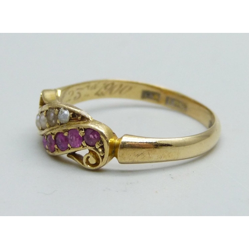 1058 - An 18ct gold, ruby and pearl ring, the inner shank with inscription dated 1900, 3.1g, Q