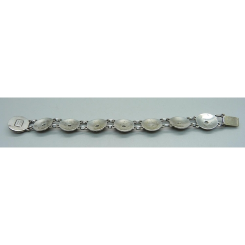 1062 - A Danish Arts and Crafts silver bracelet, marked Danecraft C. Ruopoli Sterling