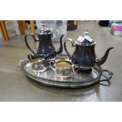 1065 - A silver plated four piece tea service and gallery tray **PLEASE NOTE THIS LOT IS NOT ELIGIBLE FOR P... 