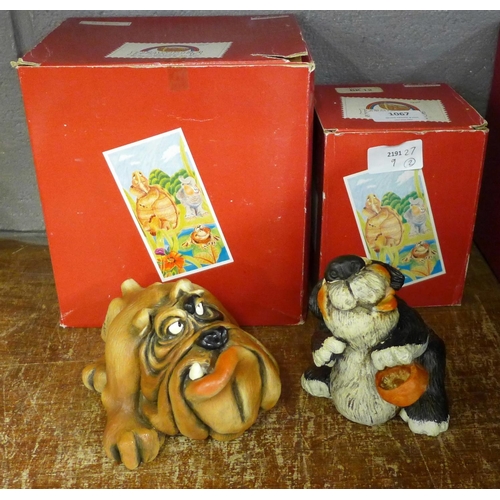 1067 - Two dog figures, both with Raya signature, boxed