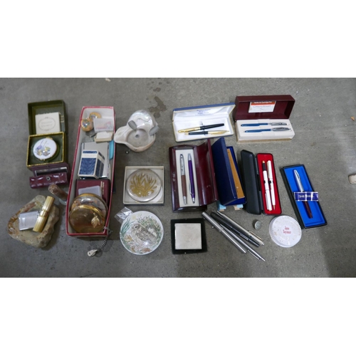 1076 - A box of compacts, lipstick holder, perfume, trinket pots, lighters and pens including Sheaffer and ... 