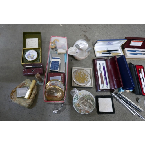 1076 - A box of compacts, lipstick holder, perfume, trinket pots, lighters and pens including Sheaffer and ... 