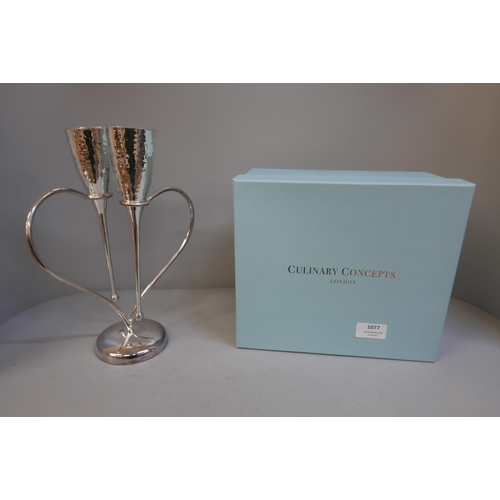 1077 - A Culinary Concepts of London hammered silver plated Lovers Flutes on Heart stand, boxed **PLEASE NO... 