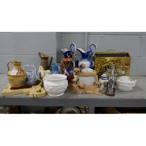 1092 - A large collection of assorted items, jugs, carved bear figures, magazine rack, etc. **PLEASE NOTE T... 