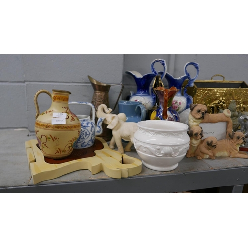 1092 - A large collection of assorted items, jugs, carved bear figures, magazine rack, etc. **PLEASE NOTE T... 