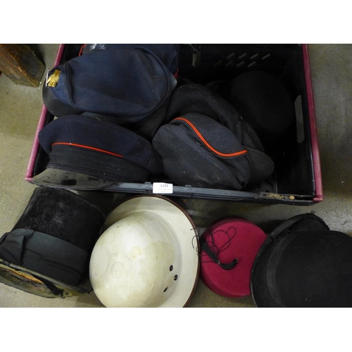 1121 - A WWII helmet, possibly ARP, other hats, bowler, top hat, pith helmet, fez, etc., a/f**PLEASE NOTE T... 