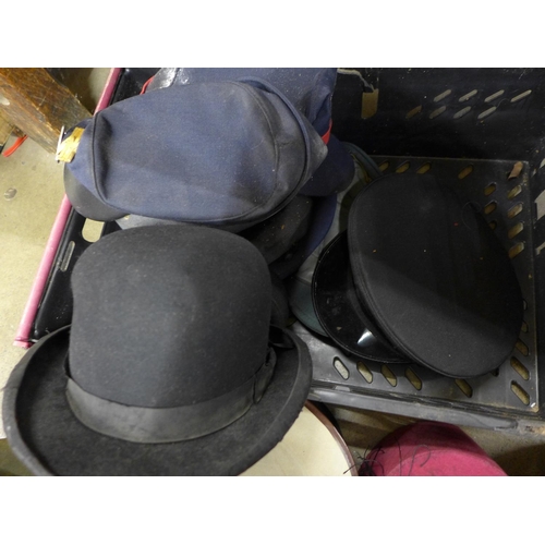 1121 - A WWII helmet, possibly ARP, other hats, bowler, top hat, pith helmet, fez, etc., a/f**PLEASE NOTE T... 