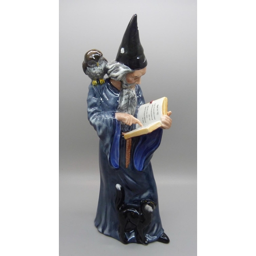 605 - A Royal Doulton The Wizard figure, HN2877