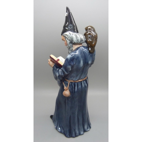 605 - A Royal Doulton The Wizard figure, HN2877