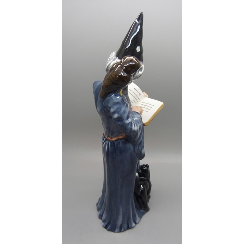 605 - A Royal Doulton The Wizard figure, HN2877