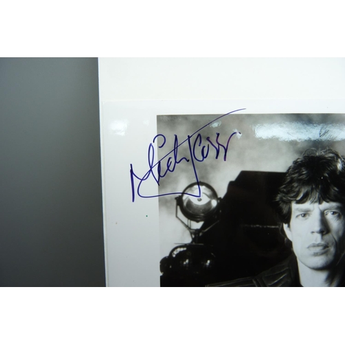 608 - A Rolling Stones Mick Jagger autographed promotional photograph