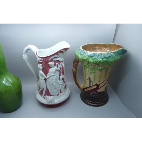 612 - A Victorian pitcher with registration lozenge to base, impressed mark Gibbs & Son, a green Bretby st... 