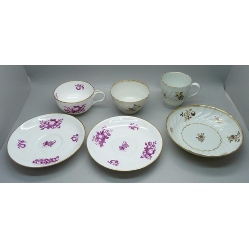 626 - A 19th Century fine porcelain cup and two saucers and a Georgian fine porcelain trio, painted and gi... 