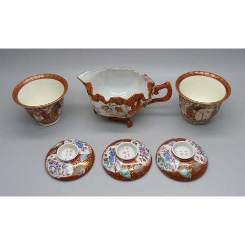 627 - A pair of rare oriental Koutani Meiji period rice wine cups, three saucer lids/bases with iron red s... 