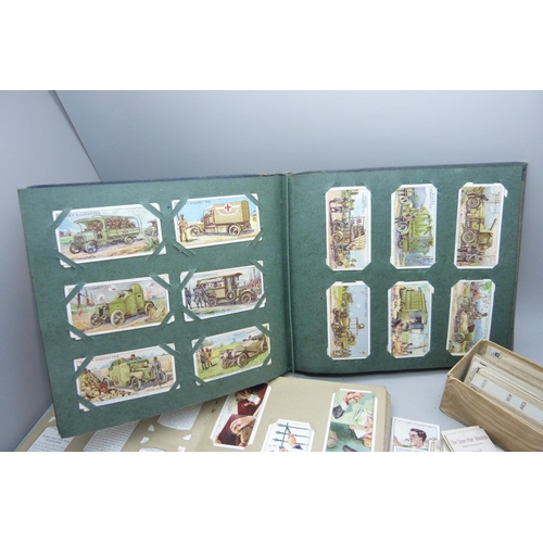 639 - A collection of military themed cigarette cards and others