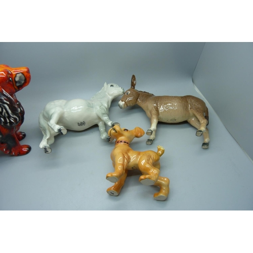 641 - Three Beswick figures including a donkey and an Anita Harris dog, signed S Johnson