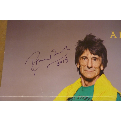 642 - Rolling Stones interest; a Ronnie Wood autographed poster